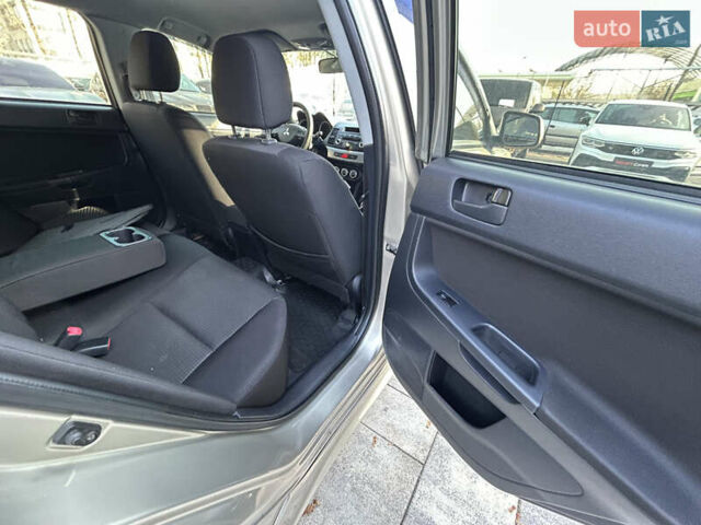 Бежевий Міцубісі Lancer, об'ємом двигуна 2 л та пробігом 250 тис. км за 8400 $, фото 24 на Automoto.ua