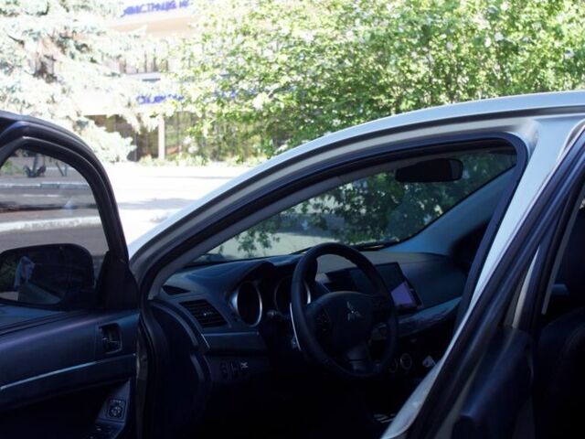 Бежевий Міцубісі Lancer, об'ємом двигуна 2 л та пробігом 220 тис. км за 7900 $, фото 7 на Automoto.ua