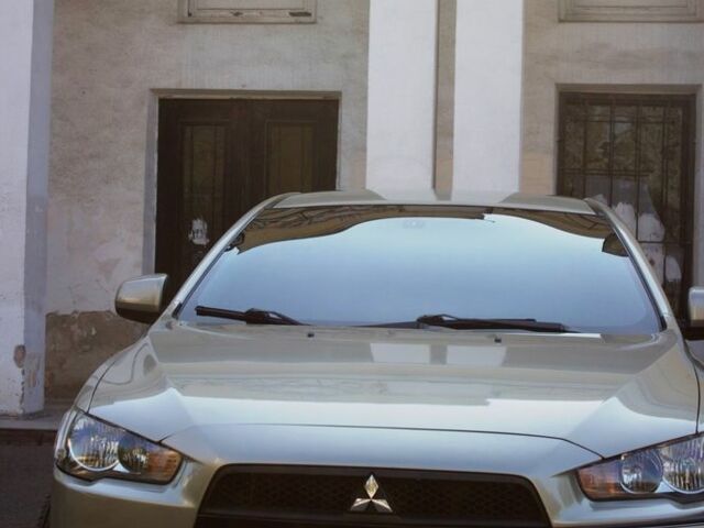 Бежевий Міцубісі Lancer, об'ємом двигуна 2 л та пробігом 220 тис. км за 7900 $, фото 1 на Automoto.ua