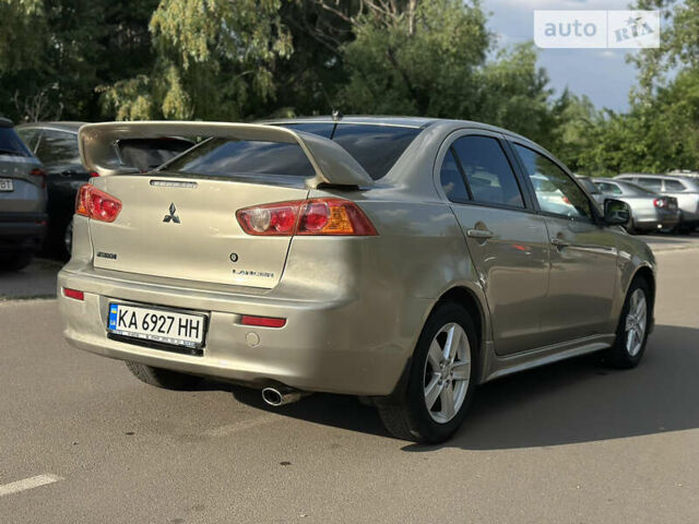 Бежевий Міцубісі Lancer, об'ємом двигуна 2 л та пробігом 205 тис. км за 5500 $, фото 4 на Automoto.ua