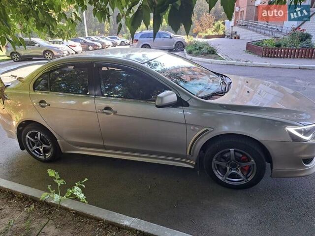 Бежевый Мицубиси Лансер, объемом двигателя 2 л и пробегом 142 тыс. км за 6300 $, фото 5 на Automoto.ua