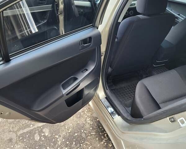 Мицубиси Лансер 2007 в Запорожье на Automoto.ua Бежевый Мицубиси Лансер, объемом двигателя 2 л и пробегом 114 тыс. км за 7450 $, фото 1 на Automoto.ua