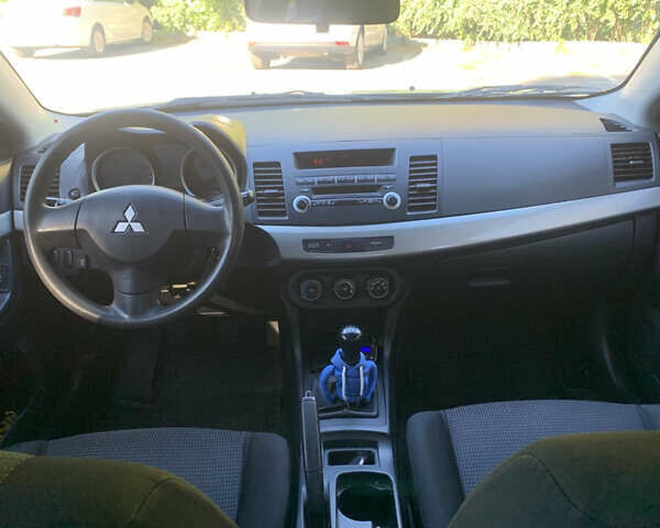 Бежевий Міцубісі Lancer, об'ємом двигуна 1.5 л та пробігом 225 тис. км за 5700 $, фото 10 на Automoto.ua