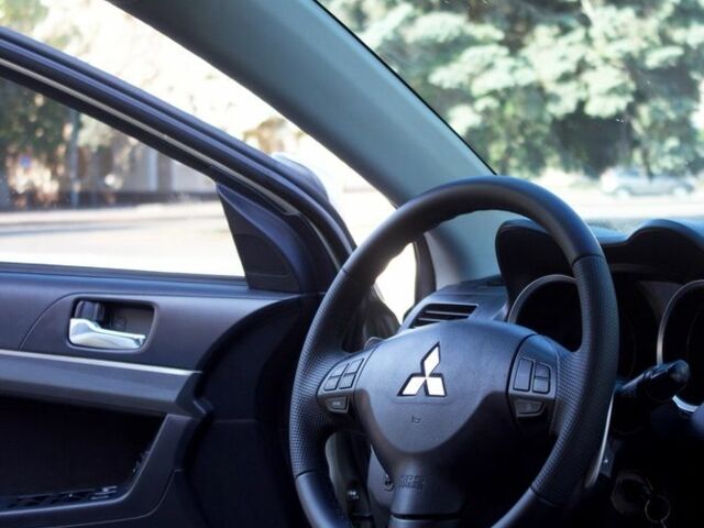 Бежевий Міцубісі Lancer, об'ємом двигуна 2 л та пробігом 220 тис. км за 7900 $, фото 9 на Automoto.ua