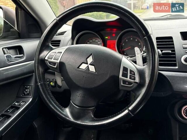 Бежевый Мицубиси Лансер, объемом двигателя 2 л и пробегом 250 тыс. км за 6500 $, фото 5 на Automoto.ua