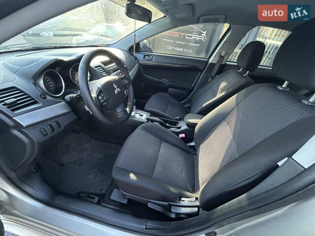 Бежевий Міцубісі Lancer, об'ємом двигуна 2 л та пробігом 250 тис. км за 8400 $, фото 15 на Automoto.ua