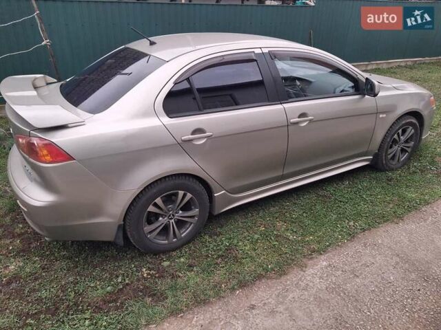 Бежевий Міцубісі Lancer, об'ємом двигуна 2 л та пробігом 160 тис. км за 7500 $, фото 2 на Automoto.ua