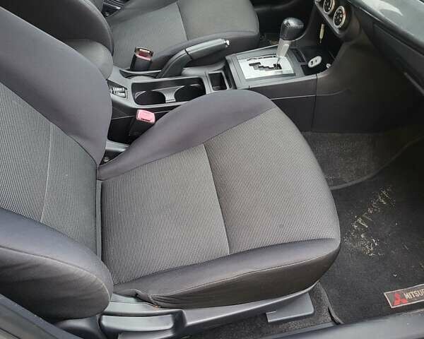 Бежевий Міцубісі Lancer, об'ємом двигуна 2 л та пробігом 180 тис. км за 6500 $, фото 8 на Automoto.ua