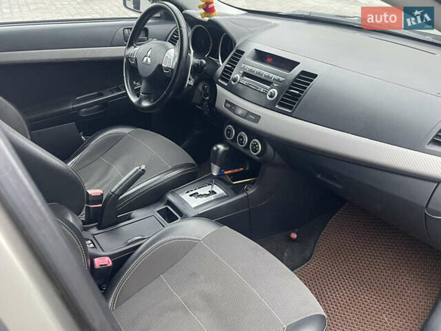 Бежевый Мицубиси Лансер, объемом двигателя 2 л и пробегом 230 тыс. км за 5599 $, фото 7 на Automoto.ua