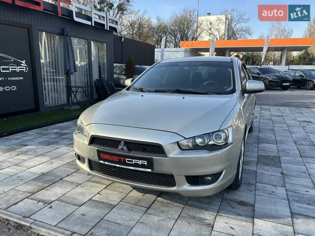 Бежевий Міцубісі Lancer, об'ємом двигуна 2 л та пробігом 250 тис. км за 8400 $, фото 4 на Automoto.ua