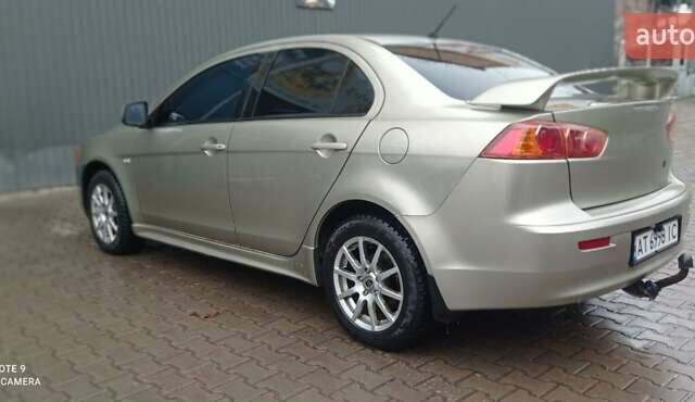 Бежевий Міцубісі Lancer, об'ємом двигуна 2 л та пробігом 200 тис. км за 6500 $, фото 6 на Automoto.ua