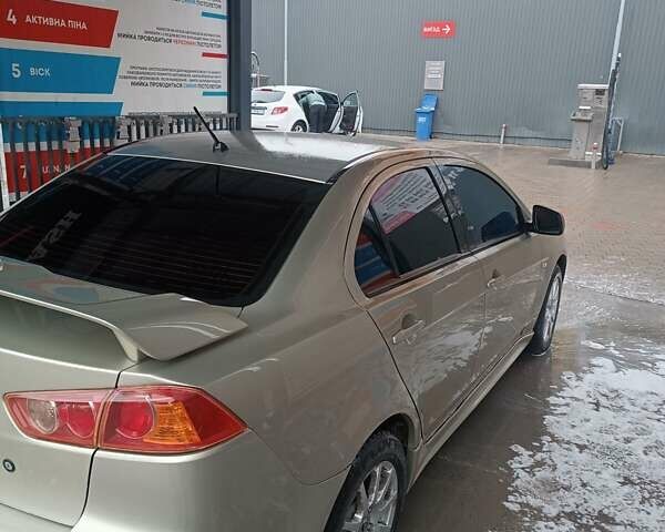 Бежевий Міцубісі Lancer, об'ємом двигуна 2 л та пробігом 200 тис. км за 6500 $, фото 11 на Automoto.ua