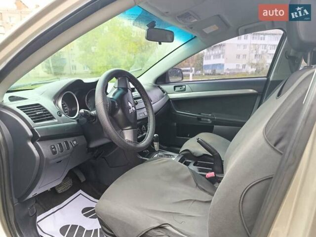 Бежевый Мицубиси Лансер, объемом двигателя 1.5 л и пробегом 326 тыс. км за 5500 $, фото 11 на Automoto.ua