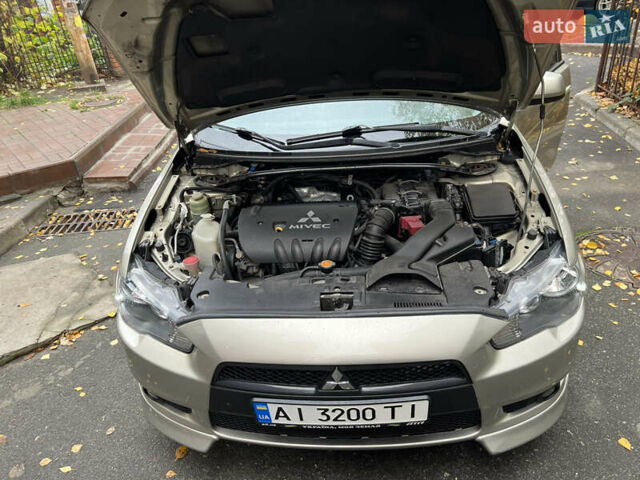 Бежевий Міцубісі Lancer, об'ємом двигуна 2 л та пробігом 240 тис. км за 6300 $, фото 9 на Automoto.ua