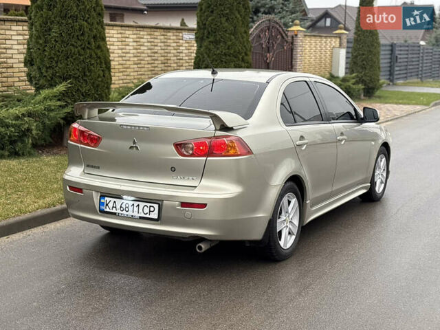 Бежевый Мицубиси Лансер, объемом двигателя 2 л и пробегом 250 тыс. км за 6400 $, фото 5 на Automoto.ua