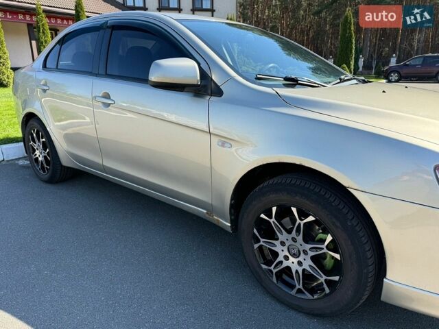 Бежевий Міцубісі Lancer, об'ємом двигуна 2 л та пробігом 156 тис. км за 4990 $, фото 9 на Automoto.ua