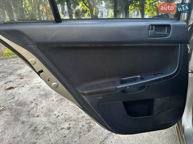 Бежевый Мицубиси Лансер, объемом двигателя 1.5 л и пробегом 192 тыс. км за 6690 $, фото 15 на Automoto.ua