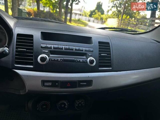 Бежевый Мицубиси Лансер, объемом двигателя 1.5 л и пробегом 192 тыс. км за 6690 $, фото 9 на Automoto.ua