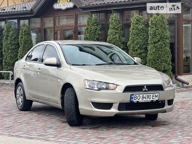 Бежевий Міцубісі Lancer, об'ємом двигуна 1.5 л та пробігом 160 тис. км за 4999 $, фото 9 на Automoto.ua