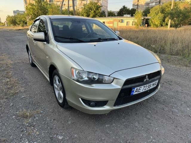 Бежевий Міцубісі Lancer, об'ємом двигуна 2 л та пробігом 240 тис. км за 4300 $, фото 1 на Automoto.ua