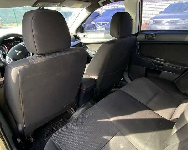 Бежевий Міцубісі Lancer, об'ємом двигуна 2 л та пробігом 250 тис. км за 5500 $, фото 3 на Automoto.ua