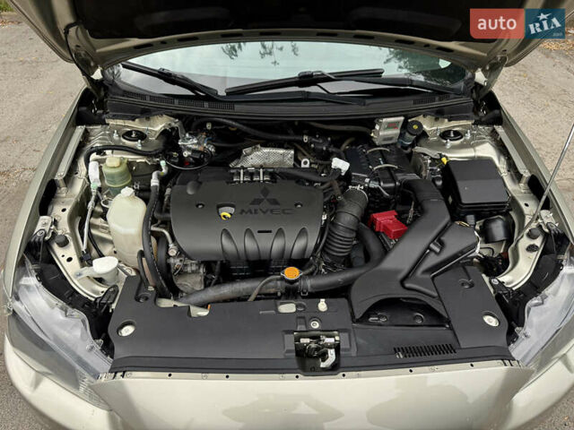 Бежевий Міцубісі Lancer, об'ємом двигуна 2 л та пробігом 280 тис. км за 8000 $, фото 28 на Automoto.ua