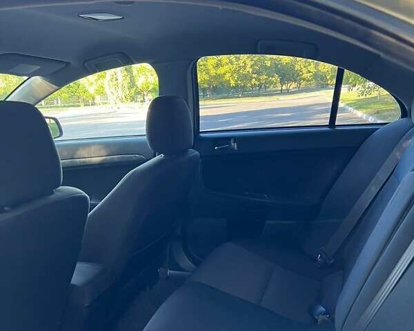 Бежевый Мицубиси Лансер, объемом двигателя 2 л и пробегом 146 тыс. км за 7750 $, фото 10 на Automoto.ua