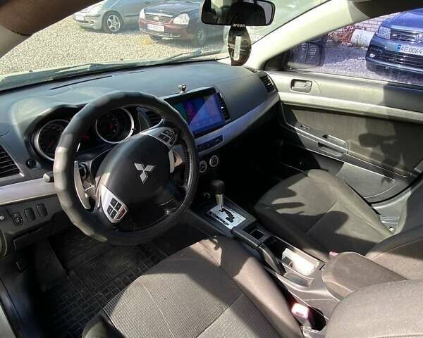 Бежевий Міцубісі Lancer, об'ємом двигуна 2 л та пробігом 250 тис. км за 5500 $, фото 4 на Automoto.ua