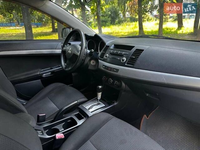 Бежевый Мицубиси Лансер, объемом двигателя 1.5 л и пробегом 192 тыс. км за 6690 $, фото 21 на Automoto.ua