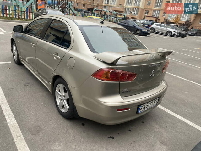 Бежевий Міцубісі Lancer, об'ємом двигуна 2 л та пробігом 173 тис. км за 7500 $, фото 7 на Automoto.ua