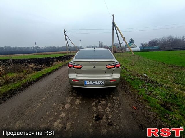 Бежевый Мицубиси Лансер, объемом двигателя 2 л и пробегом 160 тыс. км за 6500 $, фото 4 на Automoto.ua