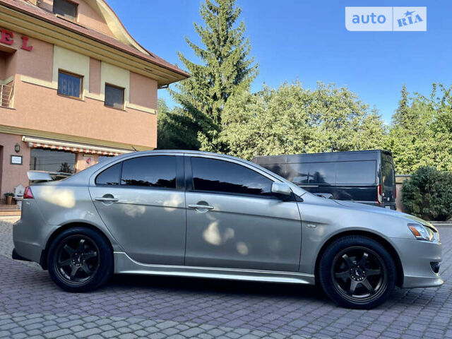 Бежевий Міцубісі Lancer, об'ємом двигуна 2 л та пробігом 222 тис. км за 6750 $, фото 32 на Automoto.ua