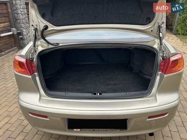 Бежевый Мицубиси Лансер, объемом двигателя 1.5 л и пробегом 230 тыс. км за 5950 $, фото 15 на Automoto.ua