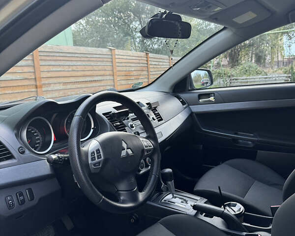 Бежевый Мицубиси Лансер, объемом двигателя 2 л и пробегом 240 тыс. км за 6500 $, фото 12 на Automoto.ua