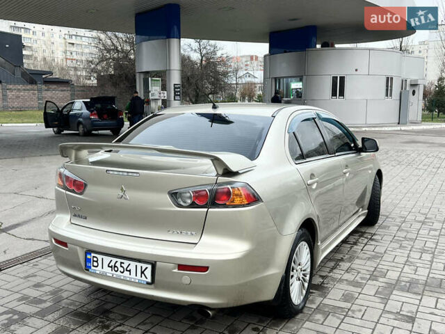 Бежевий Міцубісі Lancer, об'ємом двигуна 2 л та пробігом 262 тис. км за 6000 $, фото 2 на Automoto.ua