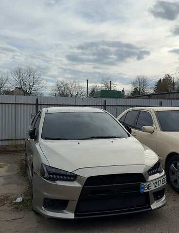 Бежевый Мицубиси Лансер, объемом двигателя 2 л и пробегом 225 тыс. км за 6999 $, фото 3 на Automoto.ua