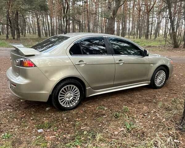 Бежевий Міцубісі Lancer, об'ємом двигуна 2 л та пробігом 262 тис. км за 6500 $, фото 5 на Automoto.ua