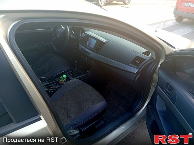 Бежевий Міцубісі Lancer, об'ємом двигуна 1.5 л та пробігом 200 тис. км за 3650 $, фото 5 на Automoto.ua