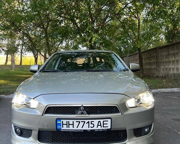 Бежевый Мицубиси Лансер, объемом двигателя 2 л и пробегом 146 тыс. км за 7750 $, фото 7 на Automoto.ua