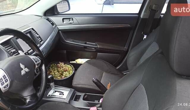 Бежевый Мицубиси Лансер, объемом двигателя 2 л и пробегом 235 тыс. км за 7200 $, фото 4 на Automoto.ua