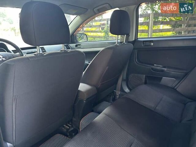 Бежевый Мицубиси Лансер, объемом двигателя 1.5 л и пробегом 192 тыс. км за 6690 $, фото 16 на Automoto.ua