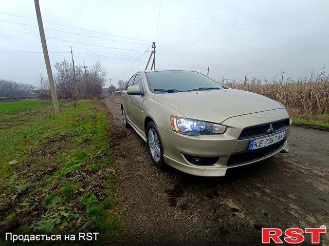 Бежевый Мицубиси Лансер, объемом двигателя 2 л и пробегом 160 тыс. км за 6500 $, фото 1 на Automoto.ua
