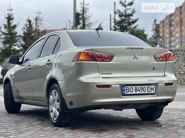 Бежевий Міцубісі Lancer, об'ємом двигуна 1.5 л та пробігом 160 тис. км за 4999 $, фото 7 на Automoto.ua