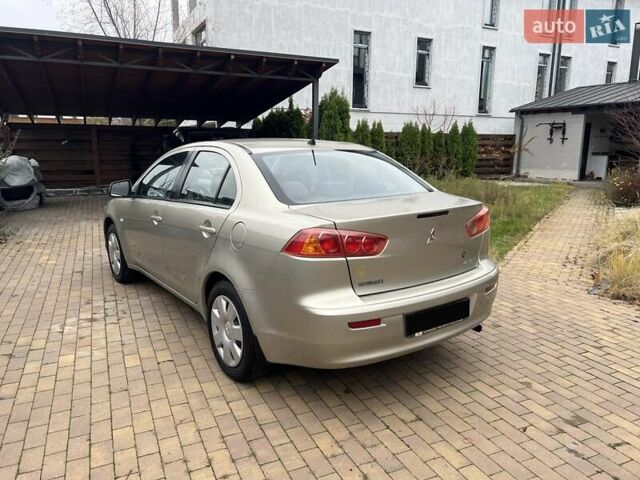 Бежевый Мицубиси Лансер, объемом двигателя 1.5 л и пробегом 230 тыс. км за 5950 $, фото 5 на Automoto.ua