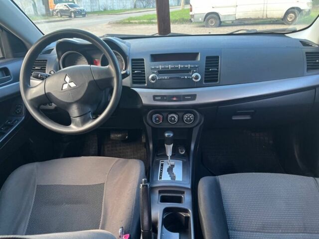 Бежевый Мицубиси Лансер, объемом двигателя 1.5 л и пробегом 226 тыс. км за 4850 $, фото 7 на Automoto.ua