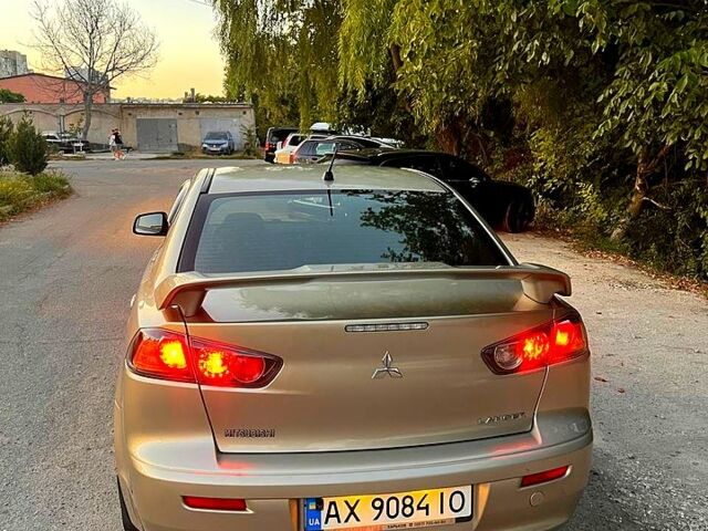 Бежевий Міцубісі Lancer, об'ємом двигуна 2 л та пробігом 68 тис. км за 8300 $, фото 2 на Automoto.ua