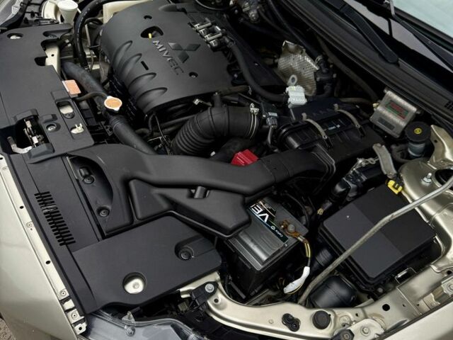 Бежевий Міцубісі Lancer, об'ємом двигуна 2 л та пробігом 280 тис. км за 8000 $, фото 20 на Automoto.ua