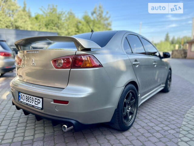 Бежевий Міцубісі Lancer, об'ємом двигуна 2 л та пробігом 222 тис. км за 6750 $, фото 33 на Automoto.ua