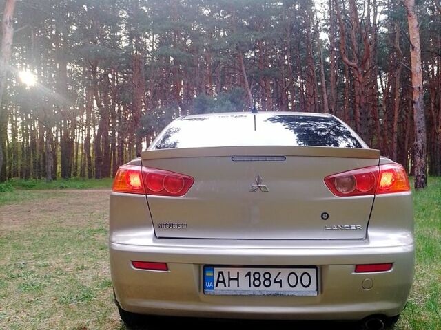 Бежевий Міцубісі Lancer, об'ємом двигуна 2 л та пробігом 164 тис. км за 6500 $, фото 4 на Automoto.ua