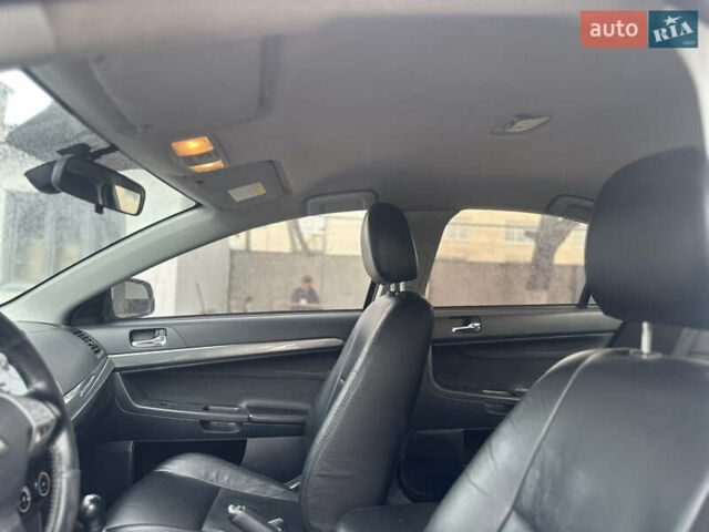 Бежевий Міцубісі Lancer, об'ємом двигуна 2 л та пробігом 312 тис. км за 4700 $, фото 12 на Automoto.ua